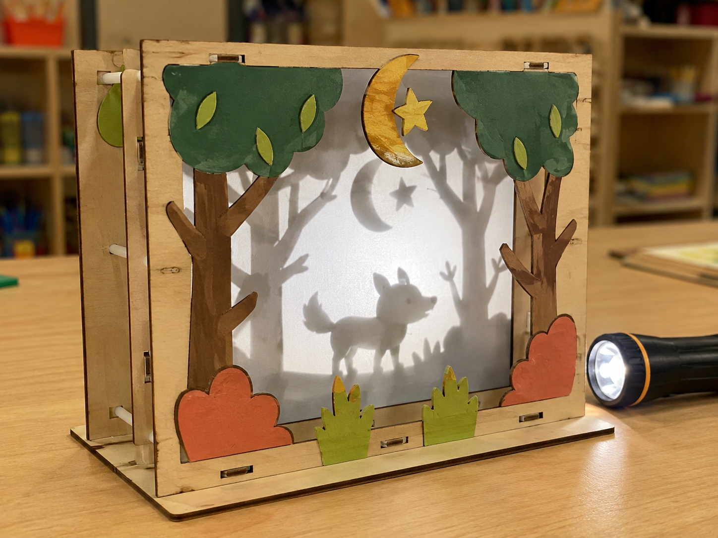 Student example of a three-layer shadow story showing a forest animal and moon